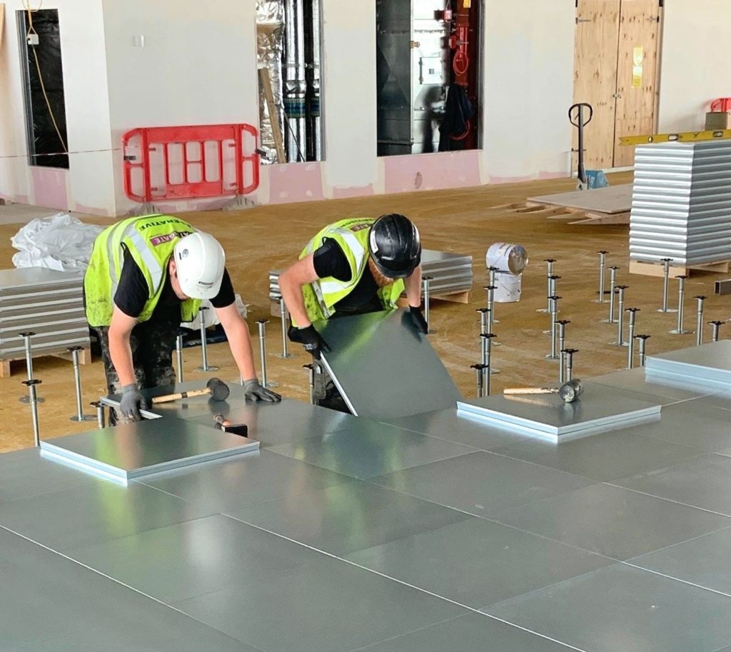 raised floor site - floor laying in action